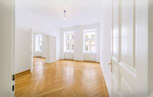 Wohnen Wohnung 4-Zimmer-Altbauwohnung mit Balkon und Fischgrätparkett in ruhiger Innenhoflage 1050 Wien