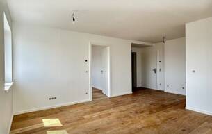 Wohnen Wohnung Moderne Traumwohnung mit Balkon in Mannswörth - Erstbezug, top Ausstattung 2320 Mannswörth