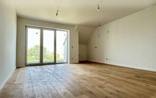 Wohnen Wohnung Erstklassige 73.8m² Wohnung mit Balkon in Mannswörth, Perfekt für Erstbezug! 2320 Mannswörth
