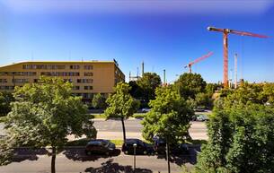 Wohnen Wohnung MAISON 29 - L'art de vivre | Erstbezug mit 3,40 m Raumhöhe! Klimatisiert + Südbalkon + lebendiger Ausblick! 1020 Wien