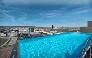 Wohnen Wohnung SENSATIONELLER BLICK über den GRÜNEN PRATER vom 26. Stock (oberste Wohnetage)! Roof-Top-Pool + Fitness + Concierge-Service + Garage 1020 Wien